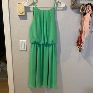 Open back and two button closure mini dress